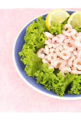 Delicious marinated shrimp in plate isolated on white