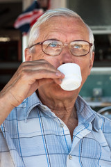 Senior man drinking coffee