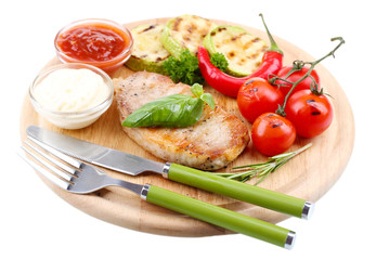 Grilled steak with spices, herbs and vegetables