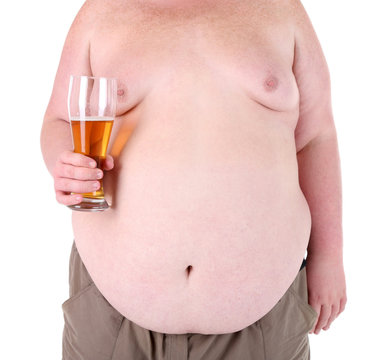 Fat man holding glass of beer, isolated on white