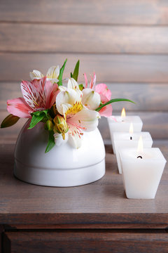 Fototapeta Alstroemeria flowers in vase on table on grey background