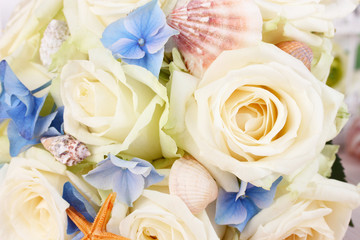 Beautiful wedding bouquet with sea decor, close up