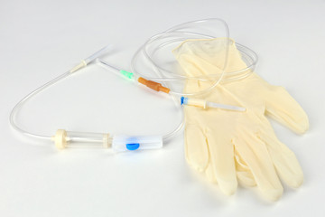 Disposable infusion set on grey background