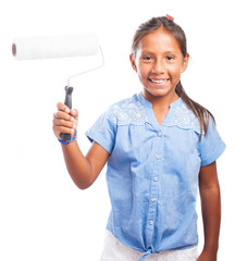 kid holding a paint roller on a white background