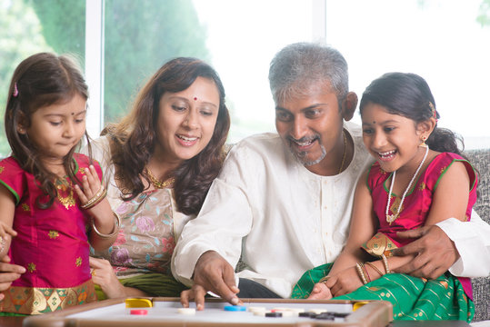 Indian family playing carrom game