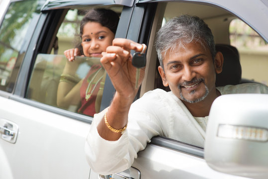 Indian Man Showing His New Car Key.