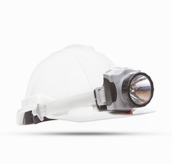 white mining safety helmet with light lamp isolated background