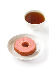 Strawberry baum cake and cup of tea