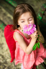 Fototapeta premium Cute child posing in the park