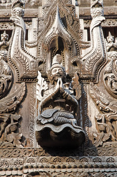 Carved figurines. Shwe Kyang monastery