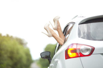 bride in wedding car