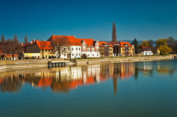 Fototapeta na wymiar Nice houses with lake in Tata, Hungary