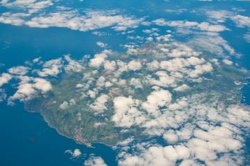 tropical carribean island aerial view through clouds © mbz1