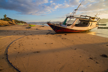 Obraz premium Fish boat at sunrise in Asia