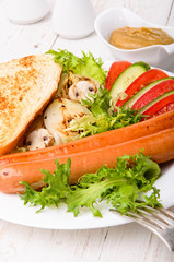 Grilled sausages and vegetables