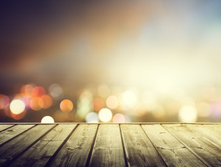 Fototapeta premium wooden platform and lights of night Hong Kong