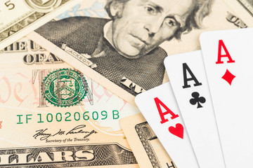 Three aces on dollar banknote