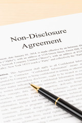 Non disclosure agreement document with pen