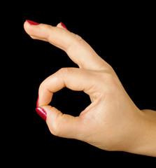 Female hand showing OK sign