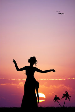 Hawaiian woman dancing at sunset