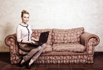 Business woman using computer. Internet home technology.