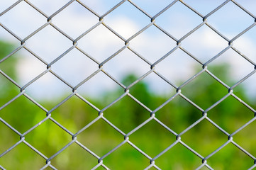 Fototapeta premium Metal mesh wire fence