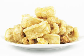 Pork rinds also known as chicharon or chicharrones, deep fried p