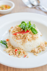 Spicy fried chicken with basil and rice