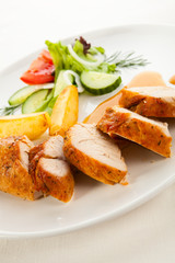 Roast chicken breast and vegetables