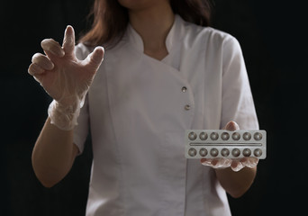 Doctor working virtual screen holding tablets
