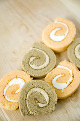roll cakes on wooden table