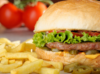 Big juicy Mexican burger with spicy jalapenos, nacho cheese