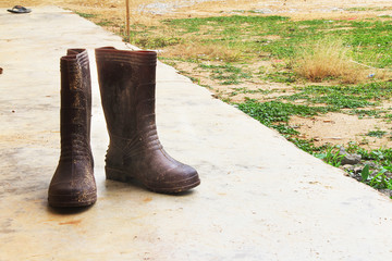Brown rubber boots for garden work