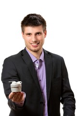 Business man holding a present