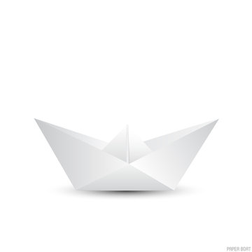 Origami paper boat on white