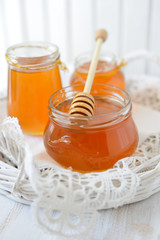 Three jars full of honey