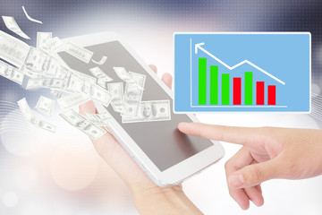 Person Using A Digital Tablet,Stock Market Provider