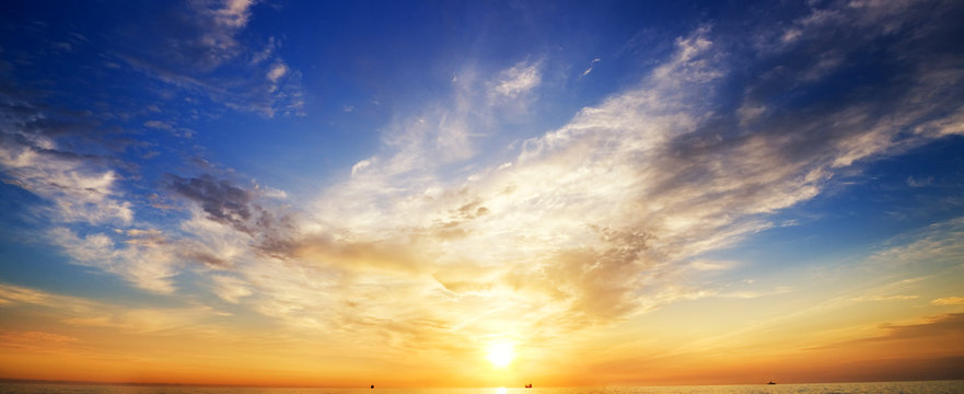 Sky background and water reflection.