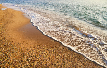Sand beach and wave.