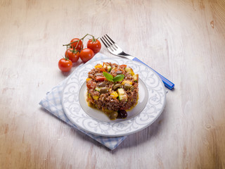 rice with zucchinis capsicum  olives and tomatoes