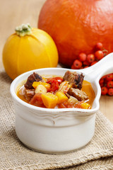 Red soup with vegetables and meat