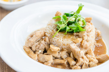 Chicken with brown sauce on rice