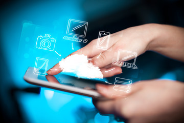 Finger pointing on tablet pc, mobile cloud concept