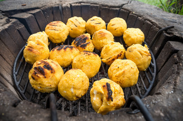 Bulz, romanian grilled polenta with cheese