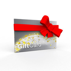 Shiny silver and gold stars gift card wrapped in red bow