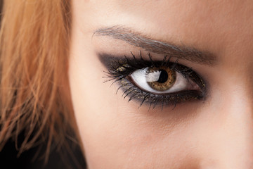 Obraz premium Portrait of a pretty girl close up eye