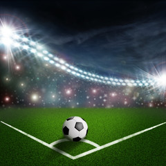 soccer ball on the green field corner