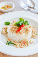 Spicy fried chicken with basil and rice
