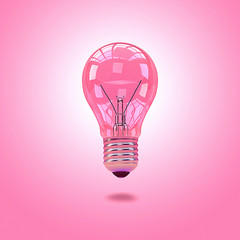 Light Bulb over pink background - 65970178