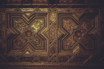 wood paneling covered with gold leaf